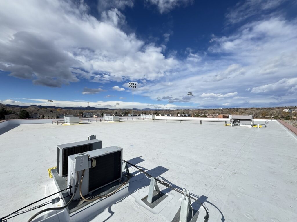 Completed commercial roof replacement at Mullen High School in Denver, Colorado