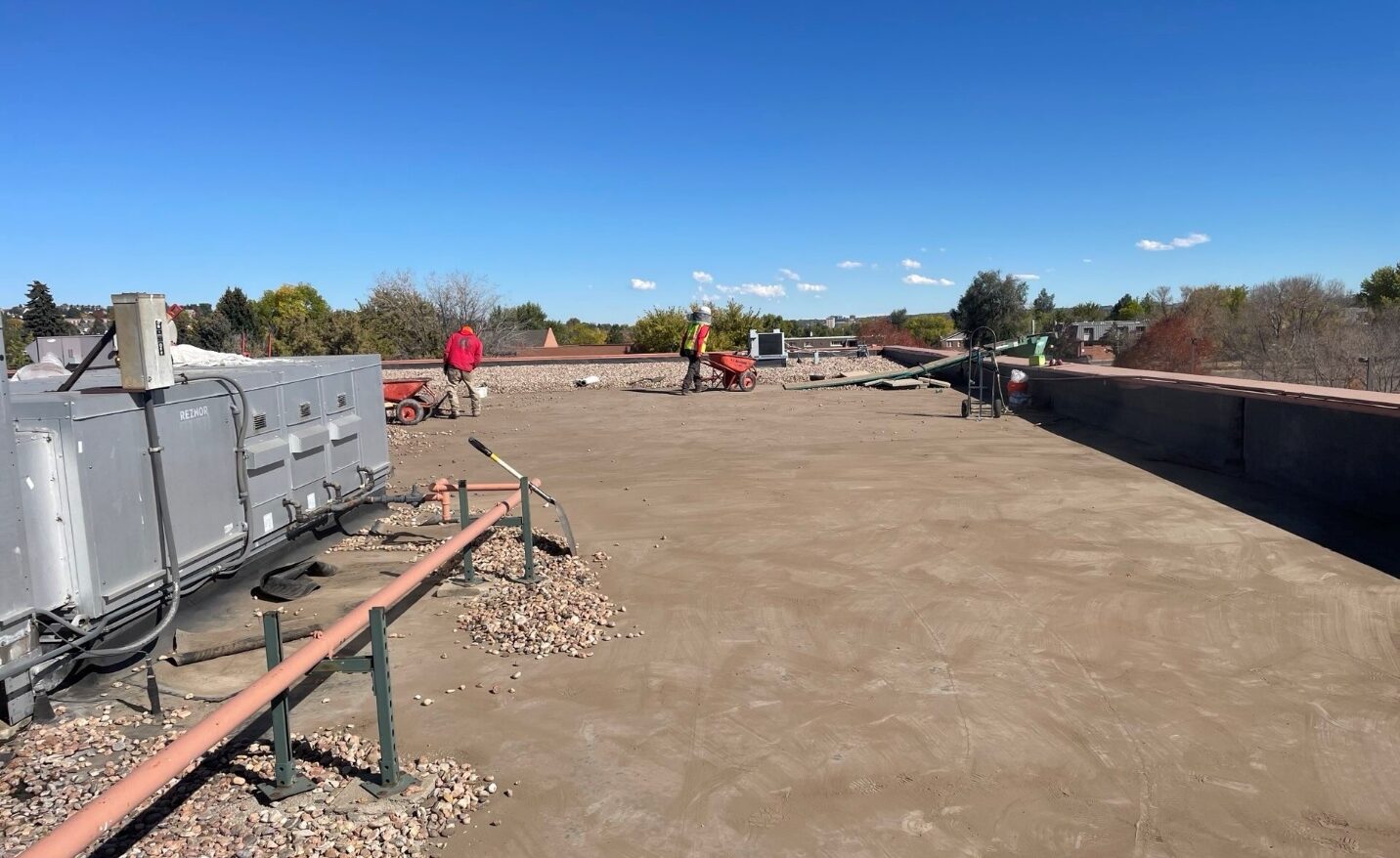 removing ballast for a commercial roof replacement